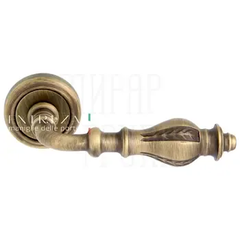 Дверная ручка Extreza "Evita" (Эвита) 301 на круглой розетке R01