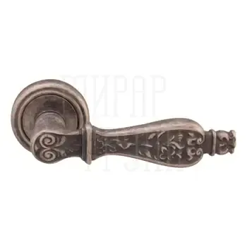Дверная ручка на розетке Melodia 465 V "Siracusa"