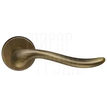 Дверная ручка Extreza Hi-Tech "TOLEDO" 323 на круглой розетке R16