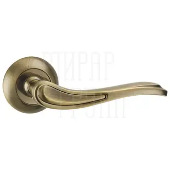 Дверная ручка Punto (Пунто) на круглой розетке "SALSA" TL