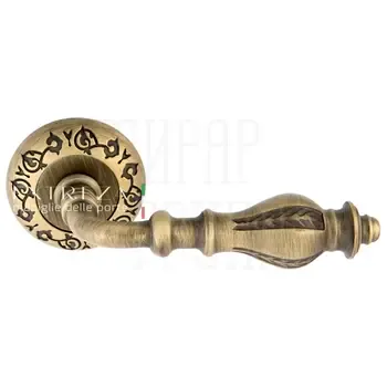 Дверная ручка Extreza "Evita" (Эвита) 301 на круглой розетке R04