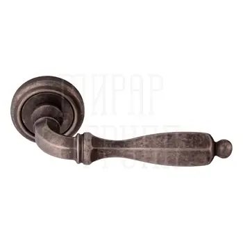 Дверная ручка на розетке Melodia 298 V "Camilla"