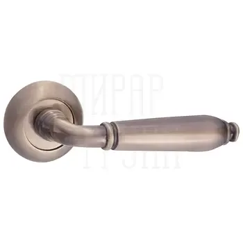 Дверные ручки Renz (Ренц) "Реджина" INDH 35-08 на круглой розетке