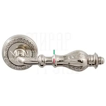 Дверная ручка Extreza "Evita" (Эвита) 301 на круглой розетке R06