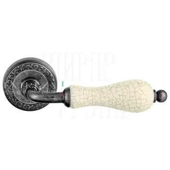 Дверная ручка Extreza "Dana" CRACKLE (Дана кракле) 306 на круглой розетке R06