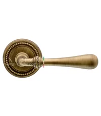 Дверная ручка Extreza "Eva" (Эва) 319 на круглой розетке R03