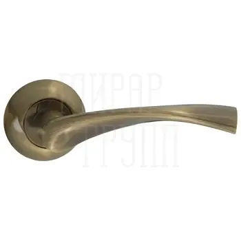 Дверные ручки Puerto (Пуэрто) INAL 506-08 на круглой розетке