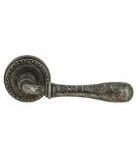 Дверная ручка Extreza "Carrera" (Каррера) 321 на круглой розетке R06