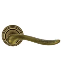 Дверная ручка Extreza "Toledo" (Толедо) 323 на круглой розетке R05