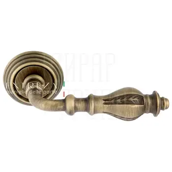 Дверная ручка Extreza "Evita" (Эвита) 301 на круглой розетке R05