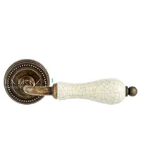 Дверная ручка Extreza "Dana" CRACKLE (Дана кракле) 306 на круглой розетке R03