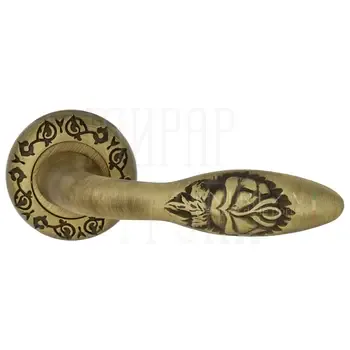 Дверная ручка Extreza "Mirel-R" на круглой розетке R04