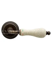 Дверная ручка Extreza "Dana" CRACKLE (Дана кракле) 306 на круглой розетке R05