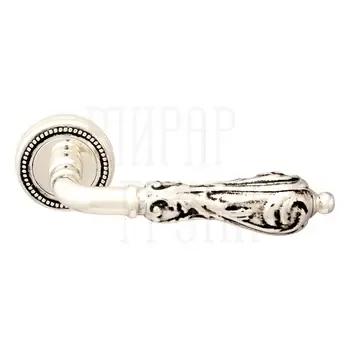 Дверная ручка на розетке Melodia 229 L "Libra"