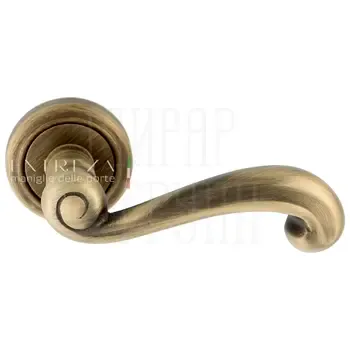 Дверная ручка Extreza "Berta" (Берта) 312 на круглой розетке R01