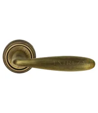 Дверная ручка Extreza "Vigo" (Виго) 324 на круглой розетке R01