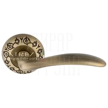 Дверная ручка Extreza "Simona" (Симона) 314 на круглой розетке R04