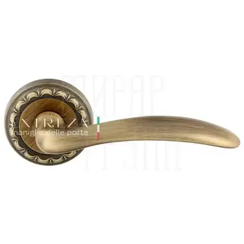 Дверная ручка Extreza "Simona" (Симона) 314 на круглой розетке R02