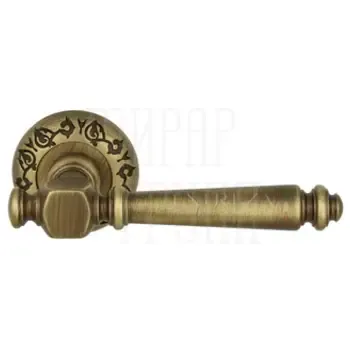 Дверная ручка Extreza "VERONIKA" (Вероника) 325 на круглой розетке R04