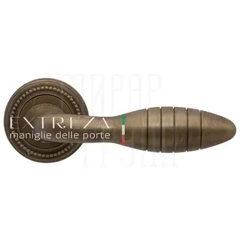 Дверная ручка Extreza "Mirel" (Мирел) 316 на круглой розетке R03