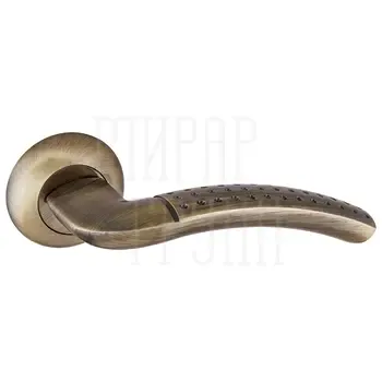 Дверная ручка Punto (Пунто) на круглой розетке "LOGICA" TL