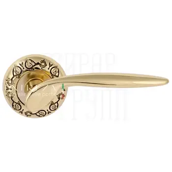 Дверная ручка Extreza "Calipso" (Калипсо) 311 на круглой розетке R04